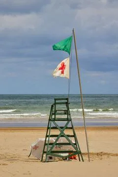 Lifeguard tower on a sandy beach Stock Photos