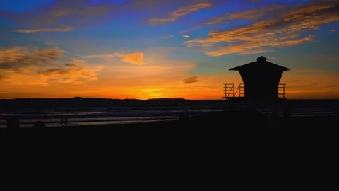 Lifeguard tower at sunset, 4K Stock Footage 101002427