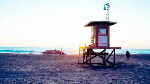 Lifeguard tower at sunset Stock Photos