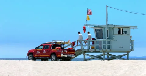 Lifeguard truck on duty in Santa Monica Beach, Los Angeles, California, 4K Stock Footage