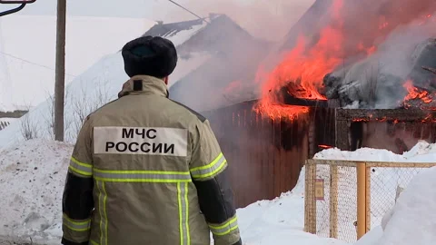Lifeguard watching the fire in winter Stock Footage 87541167