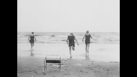 Lifeguards Training Running Into Sea Stock Footage 94071617