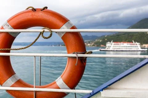 Lifeline with ferry in the background Stock Photos