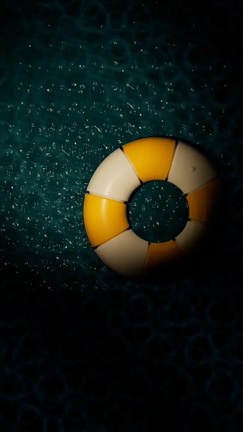 Lifesaver floating on dark water with bubbles. 3d rendering Stock Footage 339437755