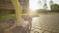 Lifestyle Of A Teenage Girl Riding A Scooter In A City Landscape. Stock Footage