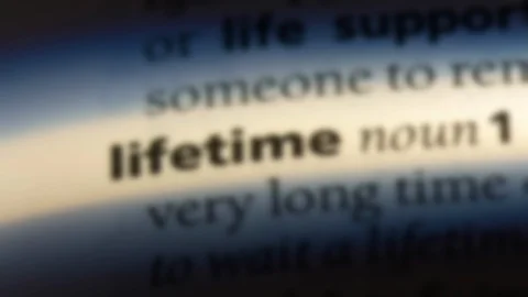Lifetime word in a dictionary. Stock Footage 99562228