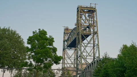 The lift bridge De Hef or Koningshavenbrug.City traffic crossing Koninginnebrug Stock Footage 286355515
