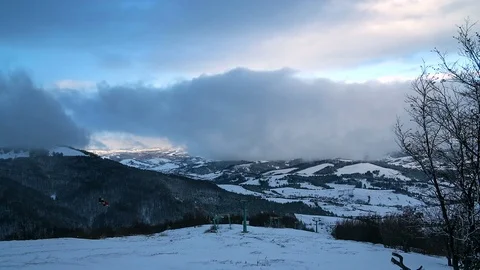 Lift in a dramatic sky in the mountains time lapse Stock Footage 84660896