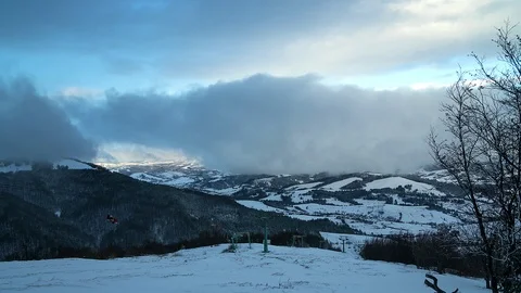 Lift in a dramatic sky in the mountains time lapse Stock Footage 98707110