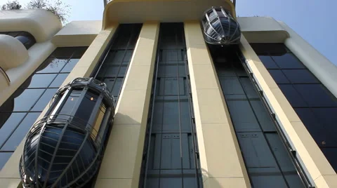 Lift Going Up The Outside Of Building Stock-Footage 1085345