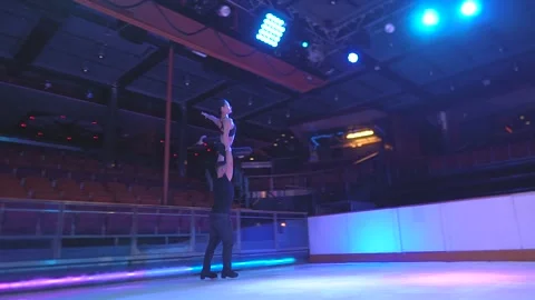 Lift up support figure skating element by international ice skaters Stock-Footage 137466725