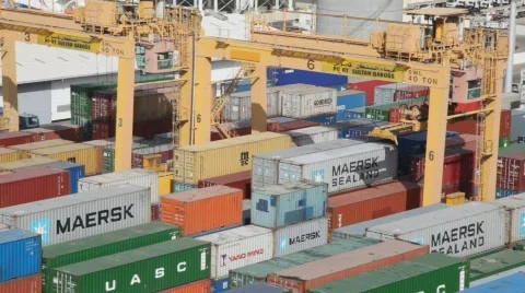 Lifter moving above stacks of containers in seaport, Muscat, Oman. Stock Footage 875477
