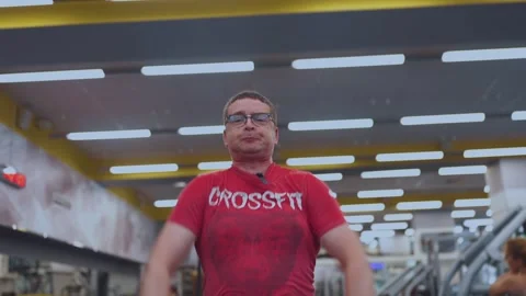 Lifting the barbell on the chest with ejection Stock Footage 247549960