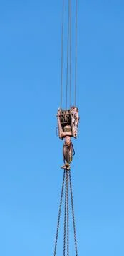 Lifting block of construction crane Stock Photos