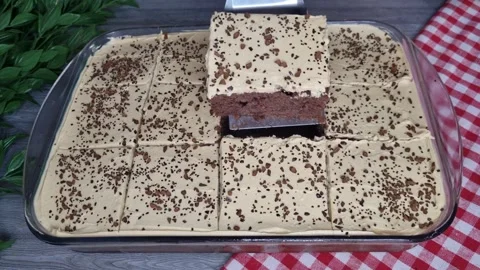 Lifting Coffee Chocolate Cake Slice with Spatula from Glass Dish - 4K Stock Footage 346751018