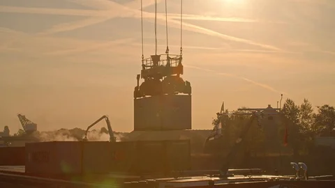Lifting up Container with Crane from Ship at Sunset Light Видео 120554233