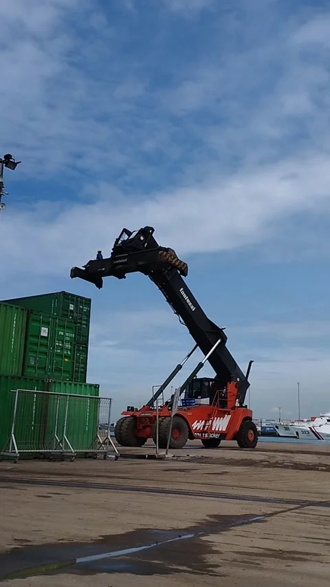 Lifting containers with a crane Stock Footage 221302416