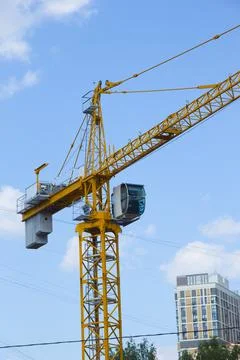 Lifting crane. Crane work on the construction site Stock Photos