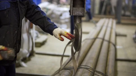 Lifting with crane in workshop. Hook of crane is ready to carry weight. Stock Footage 121588806