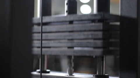 Lifting the heavy weights in the gym Stock Footage 62744599