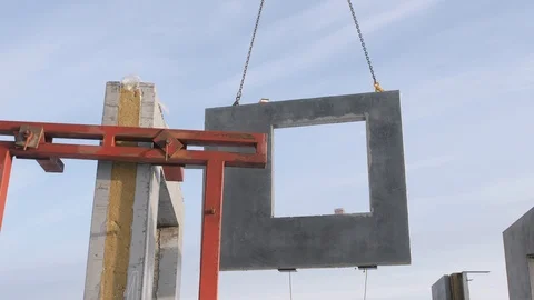 Lifting mechanism moves up wall panel to install in building Stock Footage 124892284