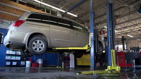 Lifting a mini van Stock Footage 35089712