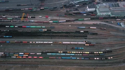 Lifting over trains located at a freight railway junction Stock Footage 252033187