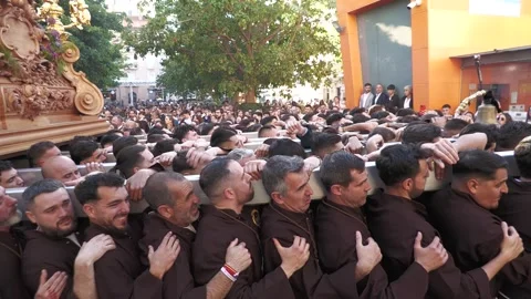 Lifting Religious Paso During Holy Week Procession in Malaga Stock Footage 336007629