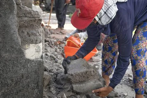 Lifting the rubble Stock Photos