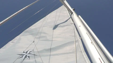Lifting sail on a boat Stock Footage 32324671
