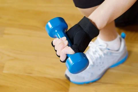 Lifting small weight for getting in shape Stock Photos