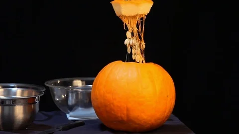 Lifting Top Off Of Pumpkin Stock Footage 97598127