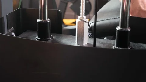 Lifting the weight of the simulator during athlete training Stock Footage 119173087