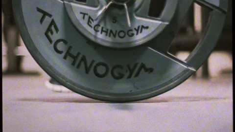 Lifting workout 16mm look Stock Footage 73430688