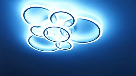 Light above, Light on a dark background, bright light, dark background. Stock Photos