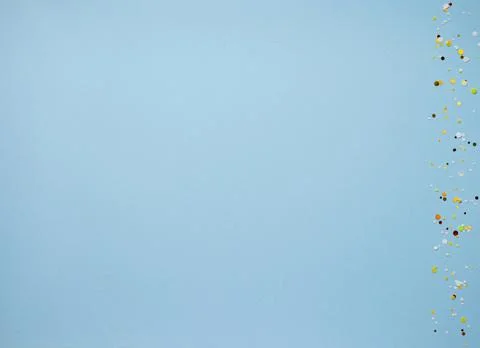 Light abstract blue background paper with round sparkles on the side. Copy space Stock Photos
