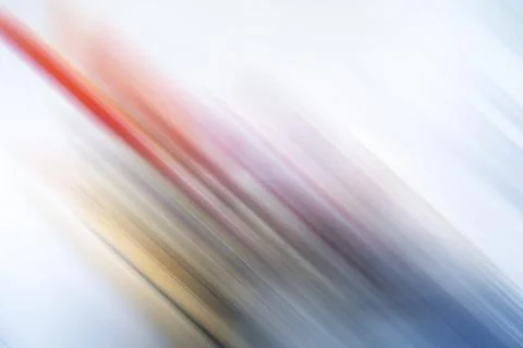 Light abstract gradient motion blurred background, colorful lines texture wallpa Stock Photos