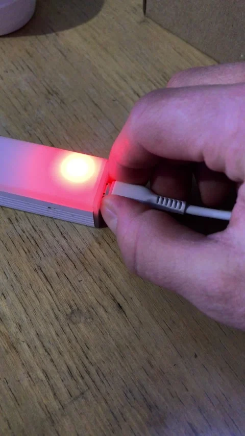 Light activation demonstration using a simple electronic device Stock Footage 307135247