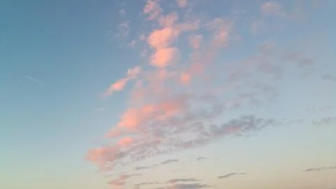 Light air pink clouds on the sunset Stock Photos