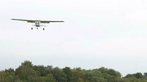 Light aircraft coming into land Stock Footage 32103903