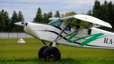 Light aircraft flying Stock Footage 98737035