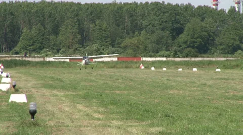 Light aircraft landing Stock Footage 36773232