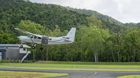 Light Aircraft With Skydivers On Take Off Stock Photos