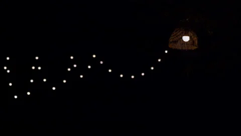 Light and blurred bokeh on night party background Stock Footage 152565719
