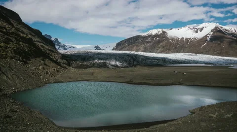 Light and clouds over lake and iceberg Iceland Landscape 4K Timelapse Stock Footage 56557516