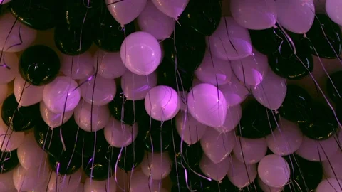 Light and dark balloons on ceiling close 動画素材 91411876