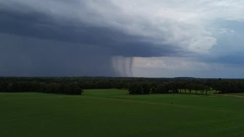 Light and dark, big clouds and a beautiful landscape, drone photography Stock Photos