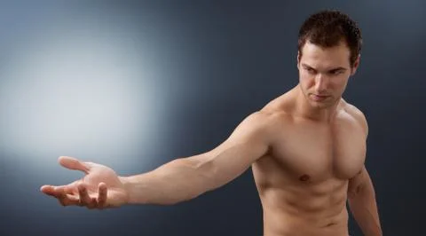 Light and power concept - creative muscular man Stock Photos