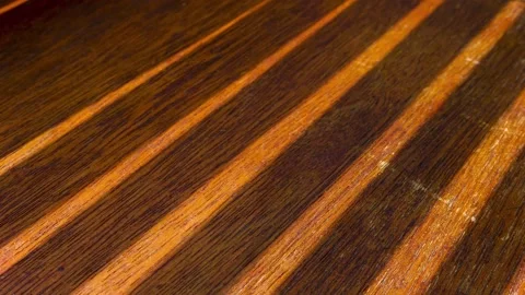 Light and Shade Pattern Streaks on Wooden Floor in Time Lapse Stock Footage 135405024