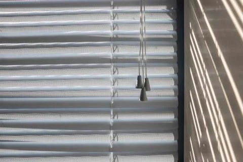 Light and shade shining on the window blinds Stock Photos